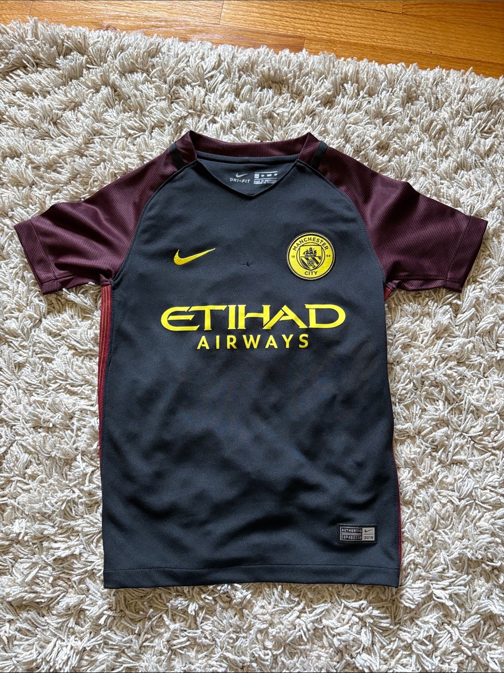 Nike Kids Black & Maroon Manchester City Soccer Jersey with Yellow Logos